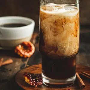 Hazelnut iced coffee in a glass.