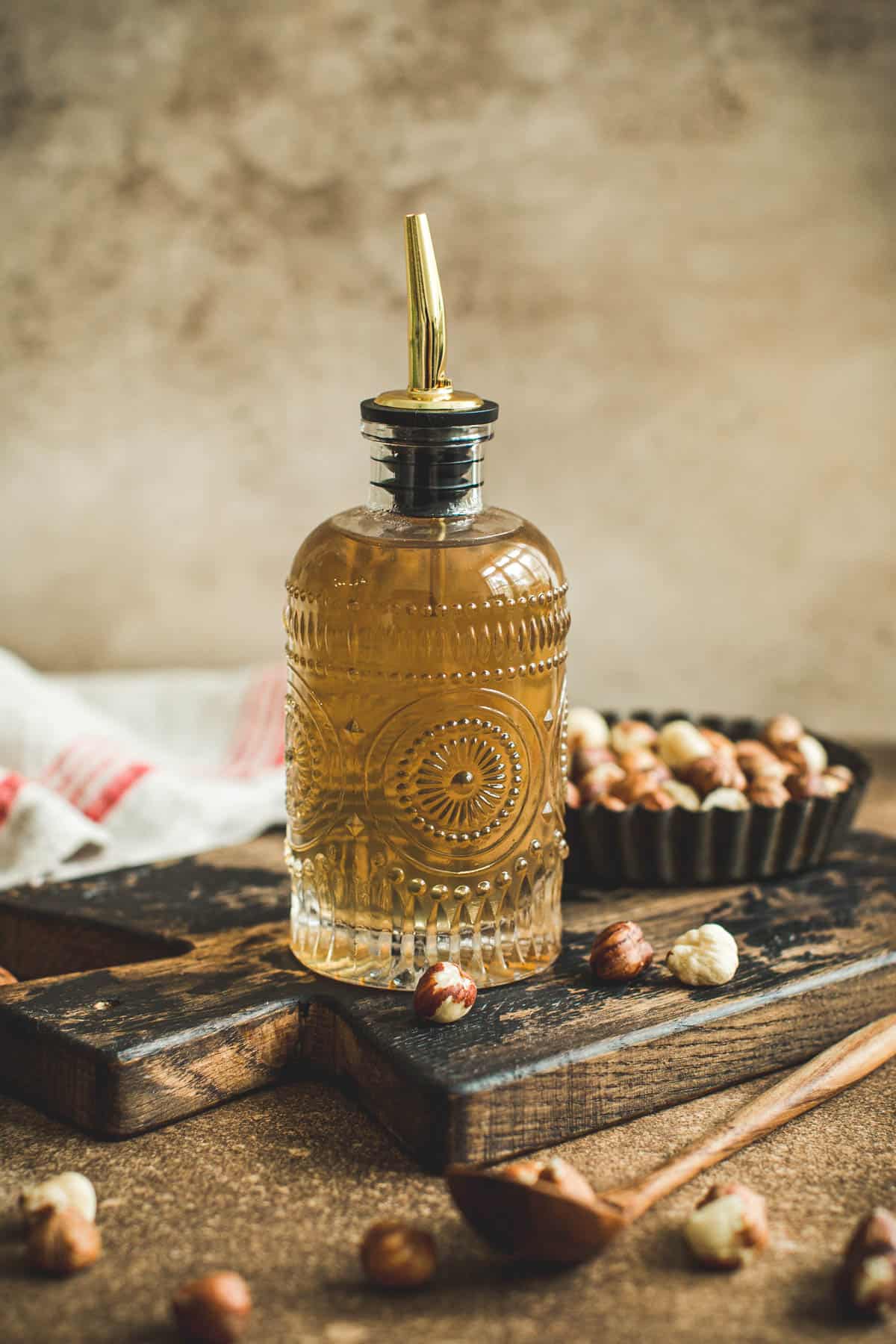 Hazelnut coffee syrup in a bottle with a stopper.