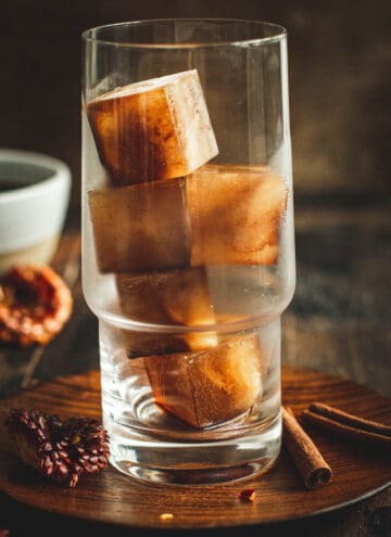 Glass filled with coffee ice cubes.