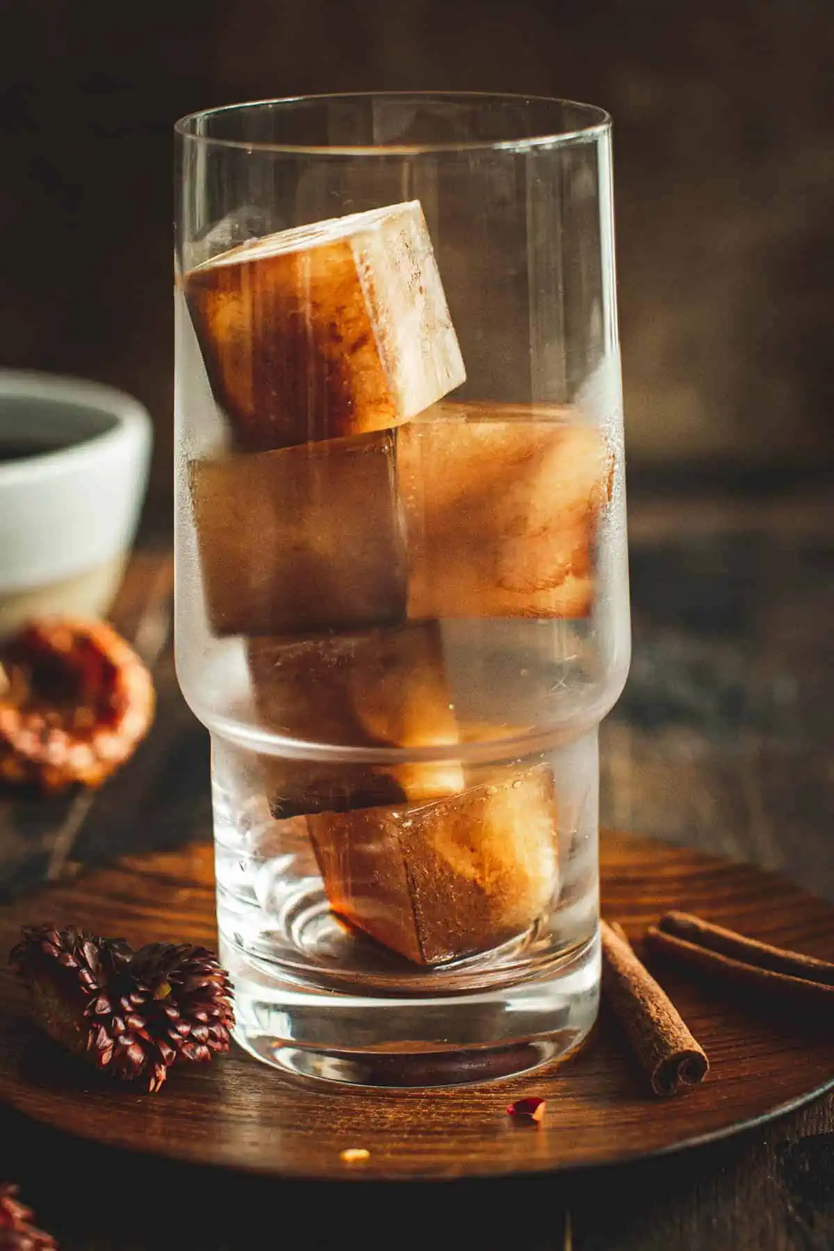 Glass filled with coffee ice cubes.