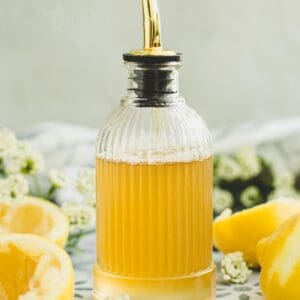 Lemon syrup in a bottle.