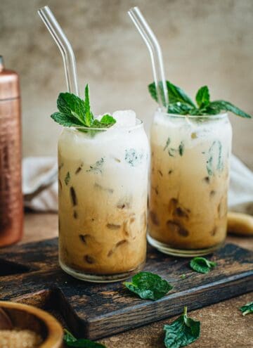 Mint mojito coffee topped with fresh mint.
