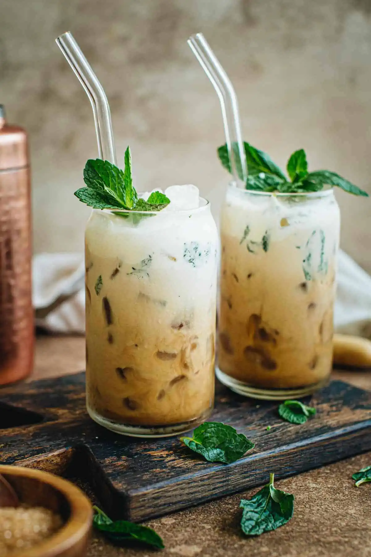 Mint mojito coffee topped with fresh mint.