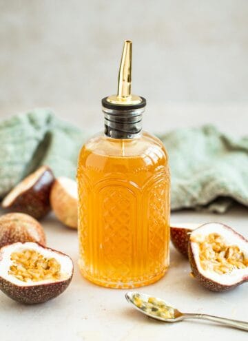 Passion fruit simple syrup in a jar.