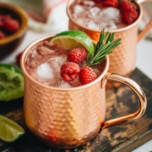 Raspberry Moscow Mules in copper mugs.