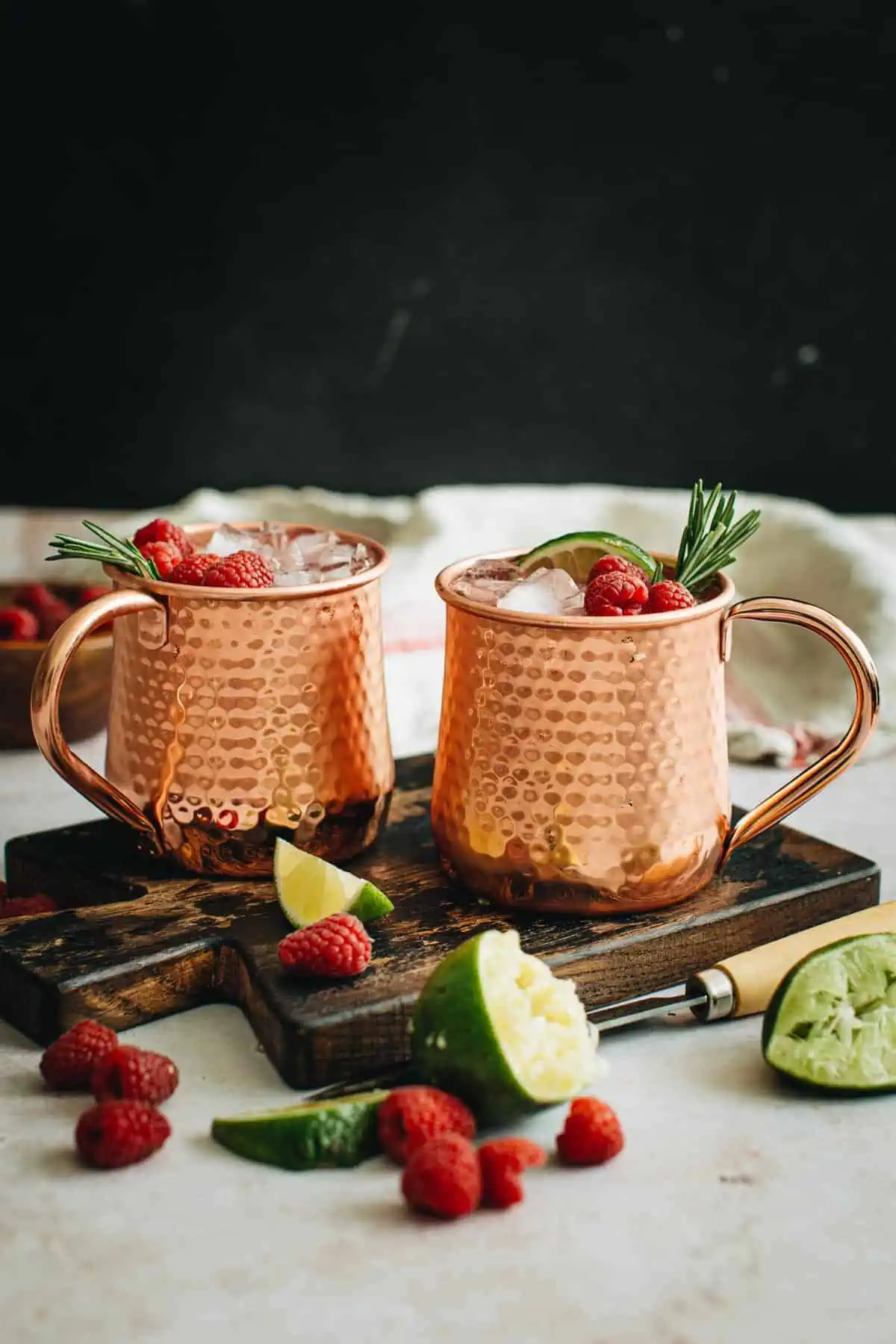 Raspberry mules in copper mugs.