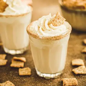Cinnamon toast crunch shots topped with whipped cream.