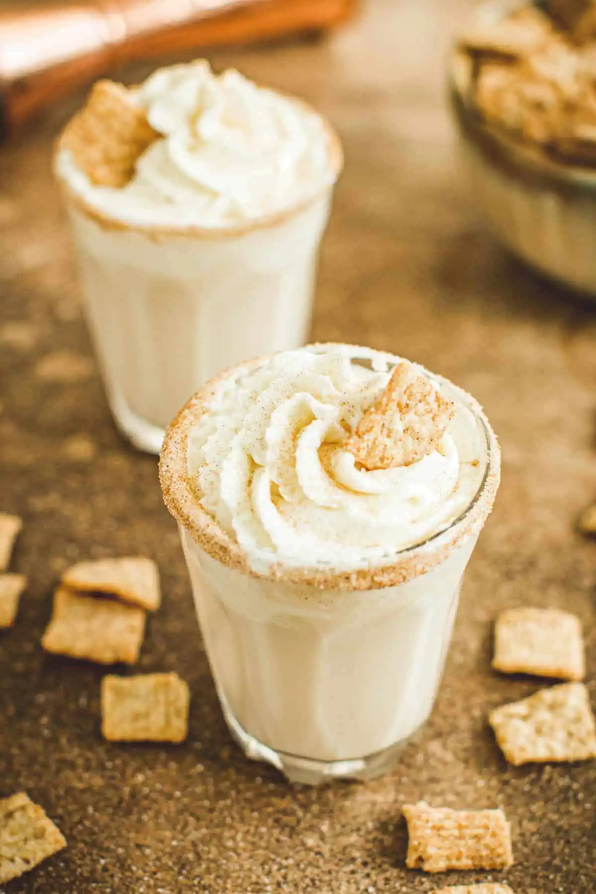 Cinnamon toast crunch shot topped with whipped cream.