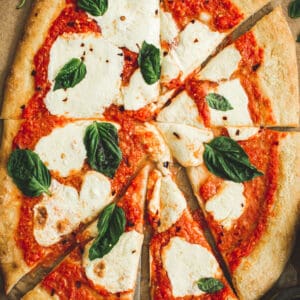 Margherita pizza sliced.