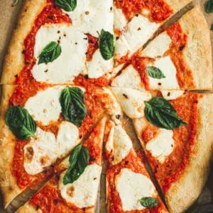 Margherita pizza sliced.