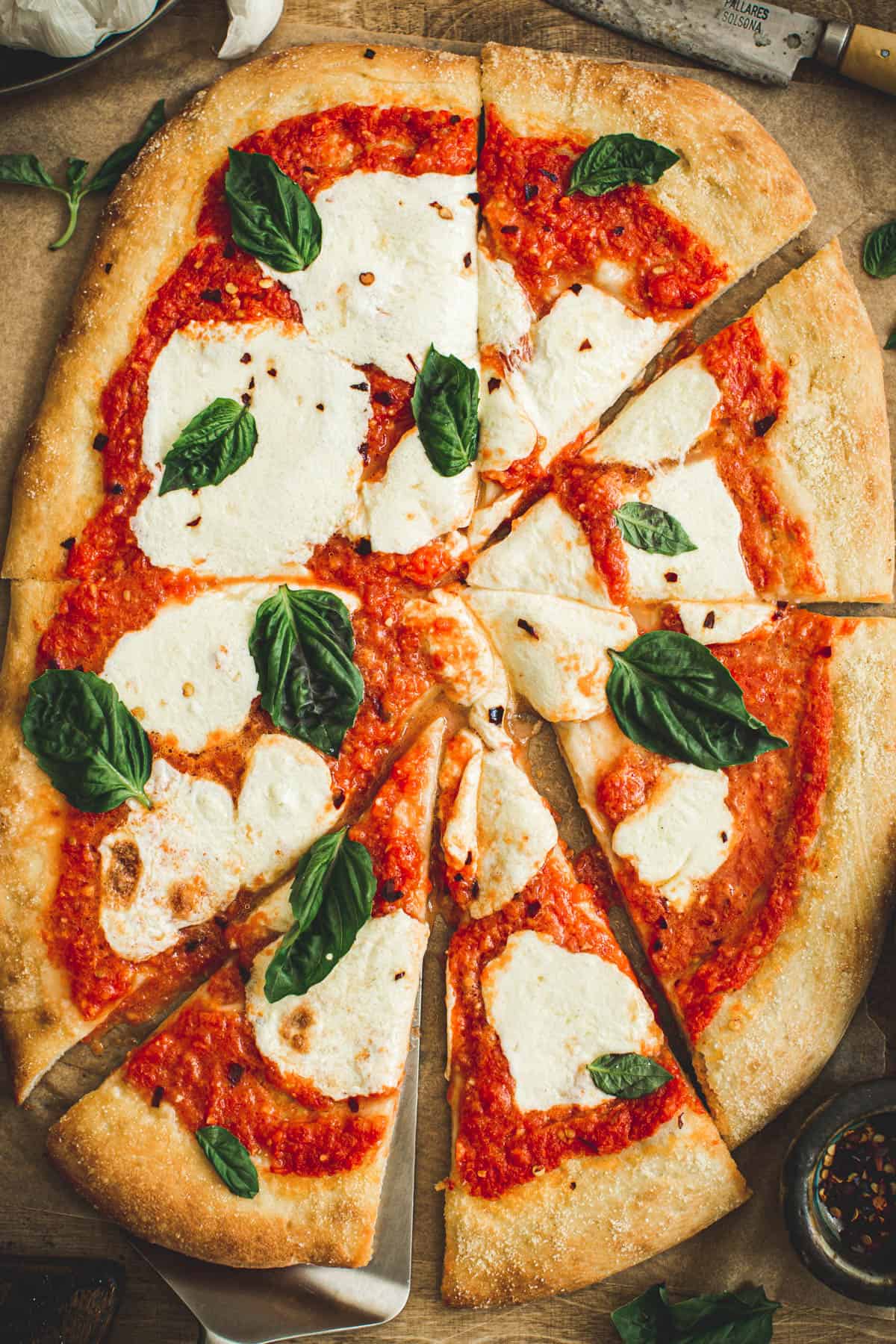 Margherita pizza sliced.