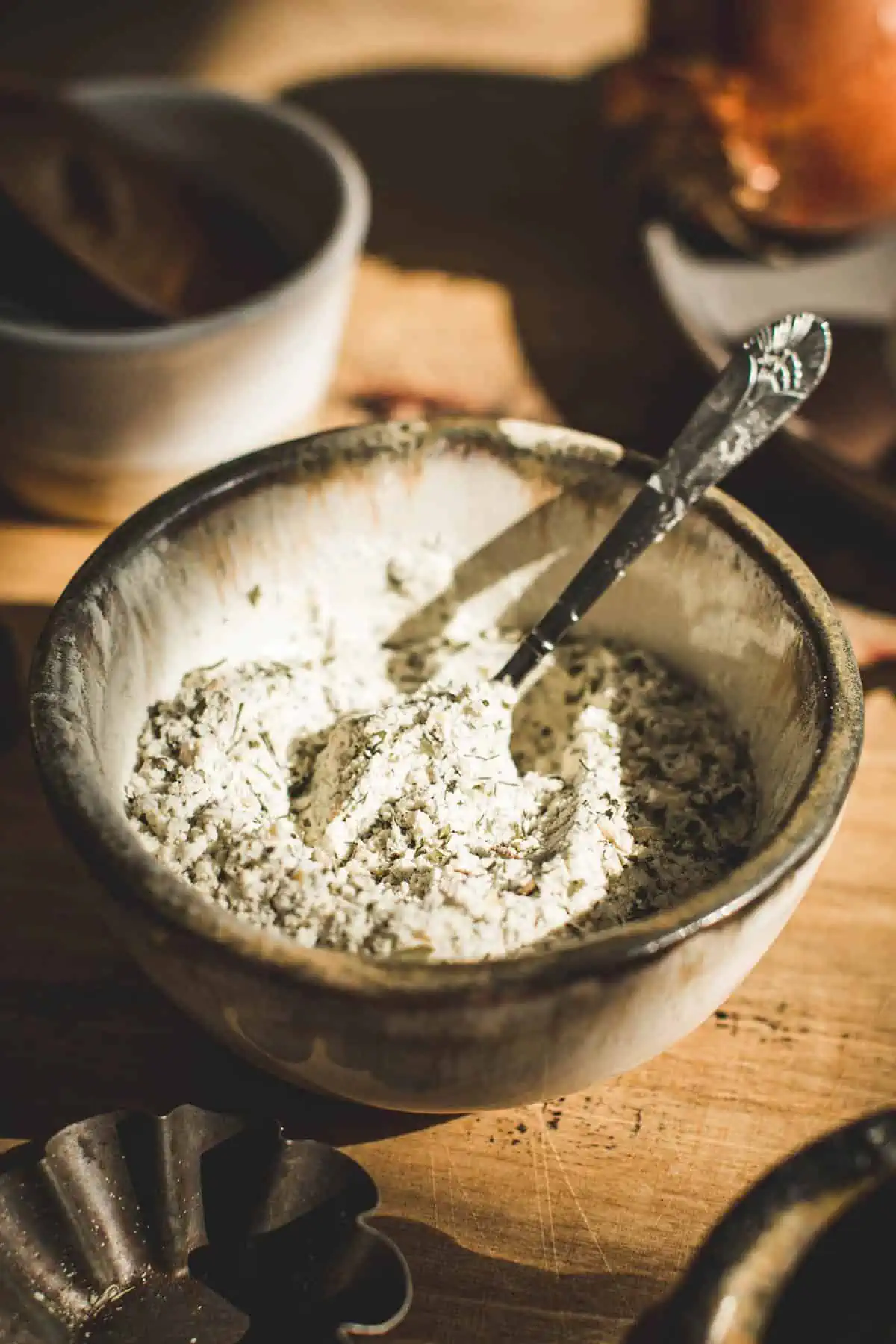 Ranch seasoning mix in a bowl with a spoon.