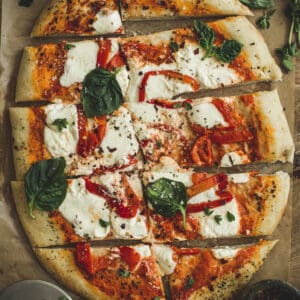 Red pepper pizza sliced.