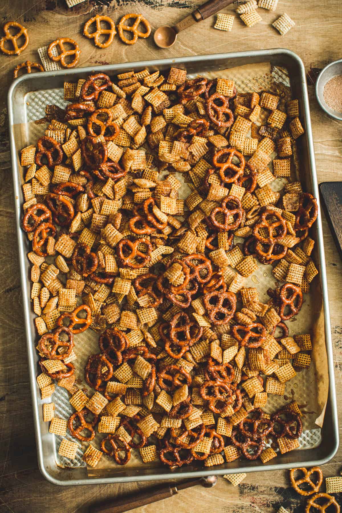 Churro Chex Mix on a sheet pan.