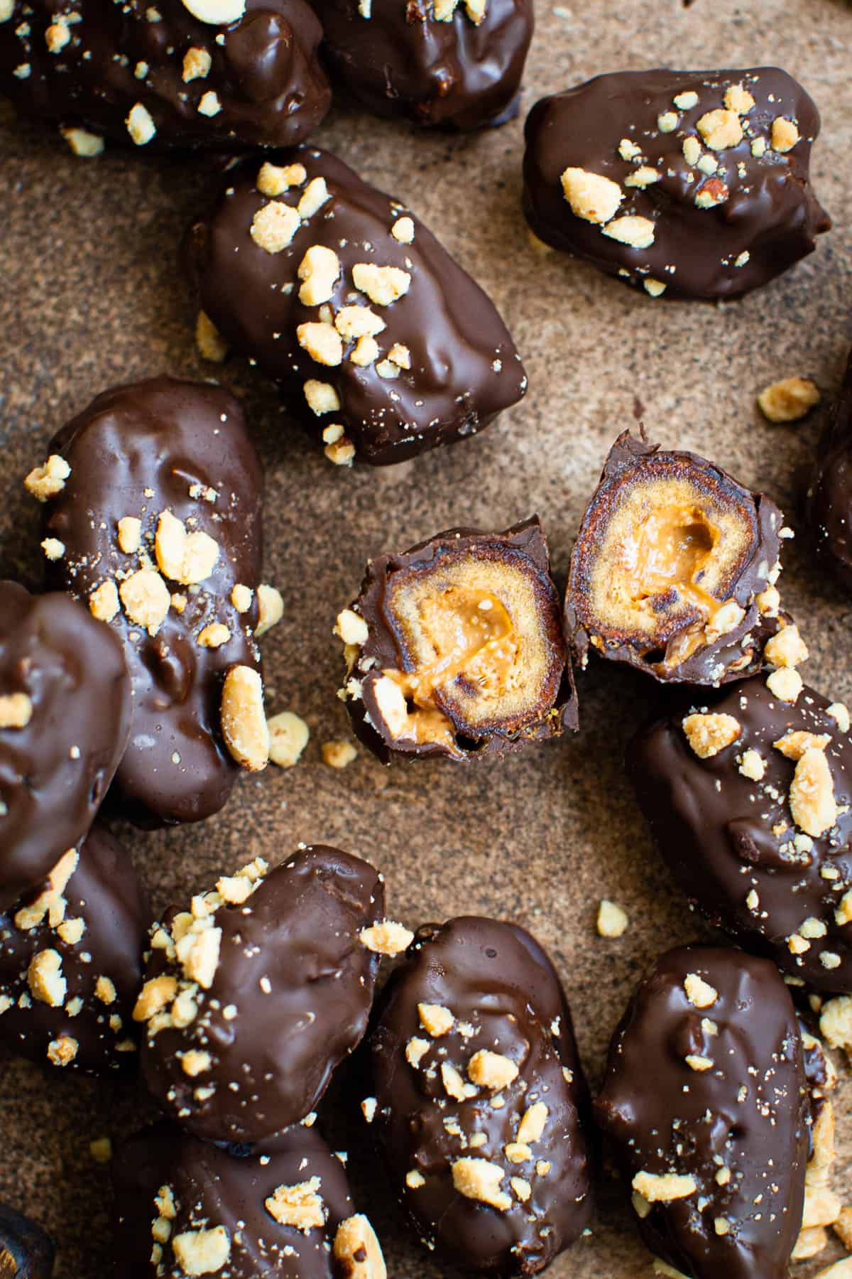 Date Snickers topped with crushed peanuts.