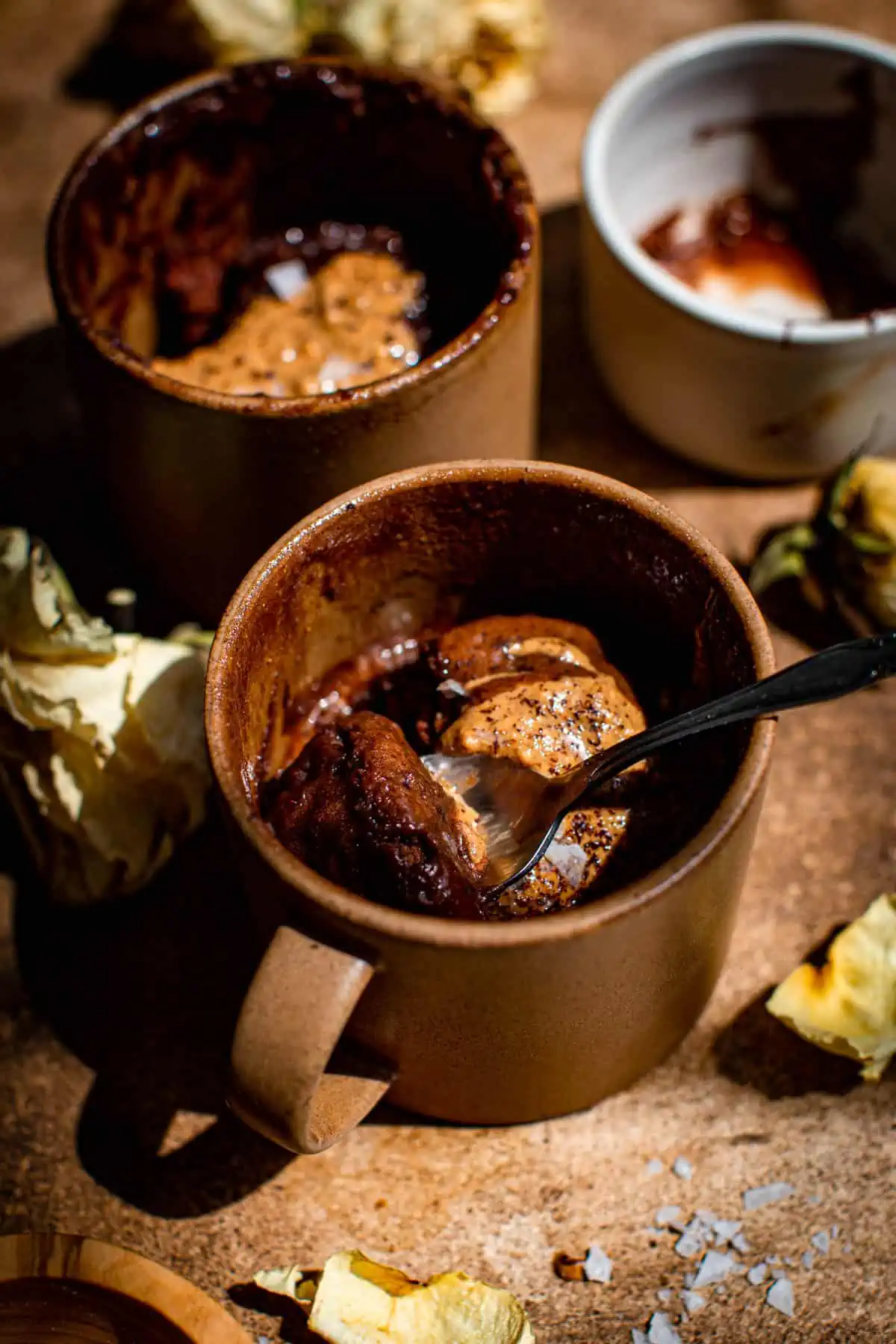 Nutella mug cake with a spoon.