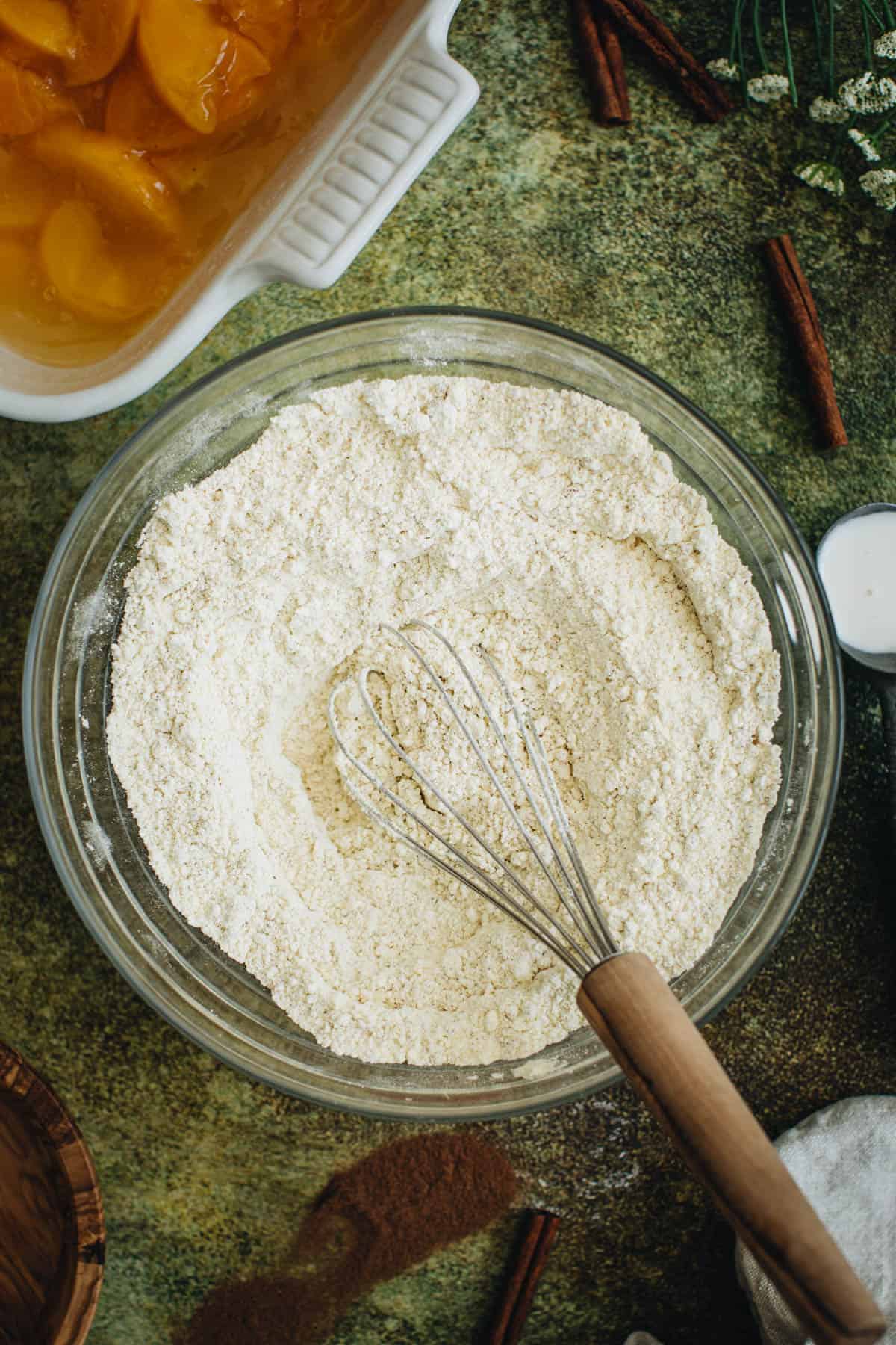 Process step 2 for making peach cobbler with cake mix.