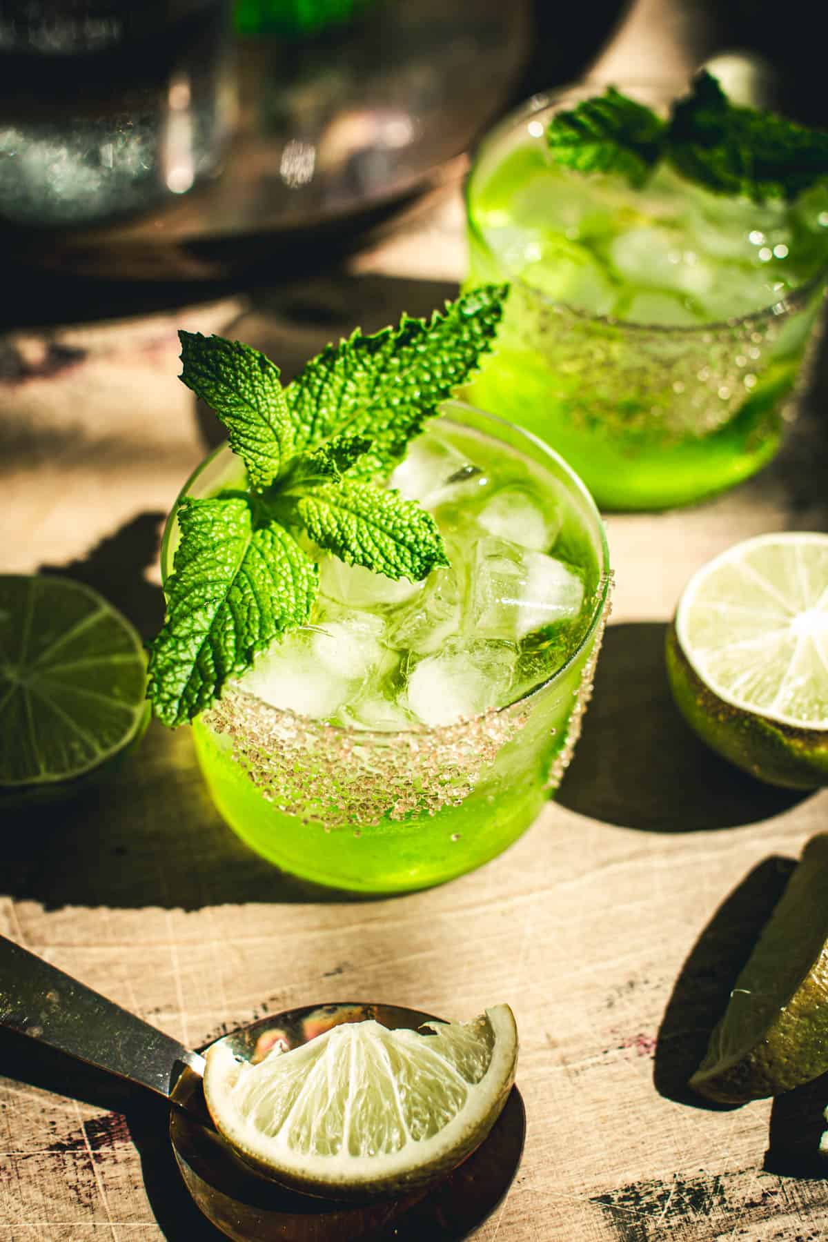Caribbean water cocktail with a mint garnish.
