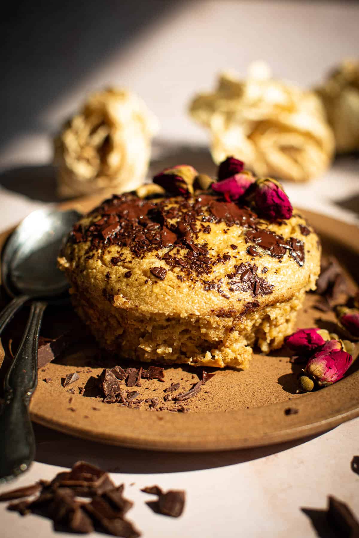 Cookie baked oatmeal with chopped chocolate on top.