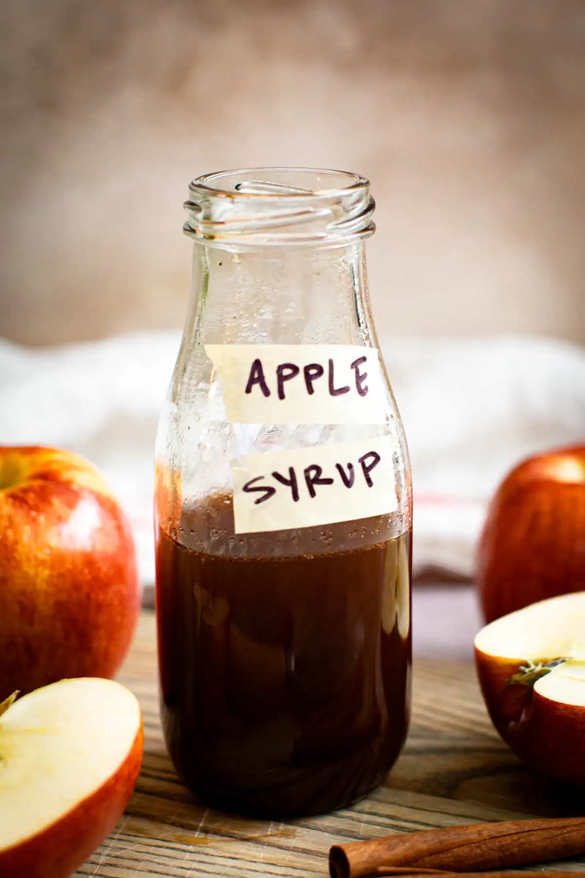 Apple brown sugar syrup in a bottle.