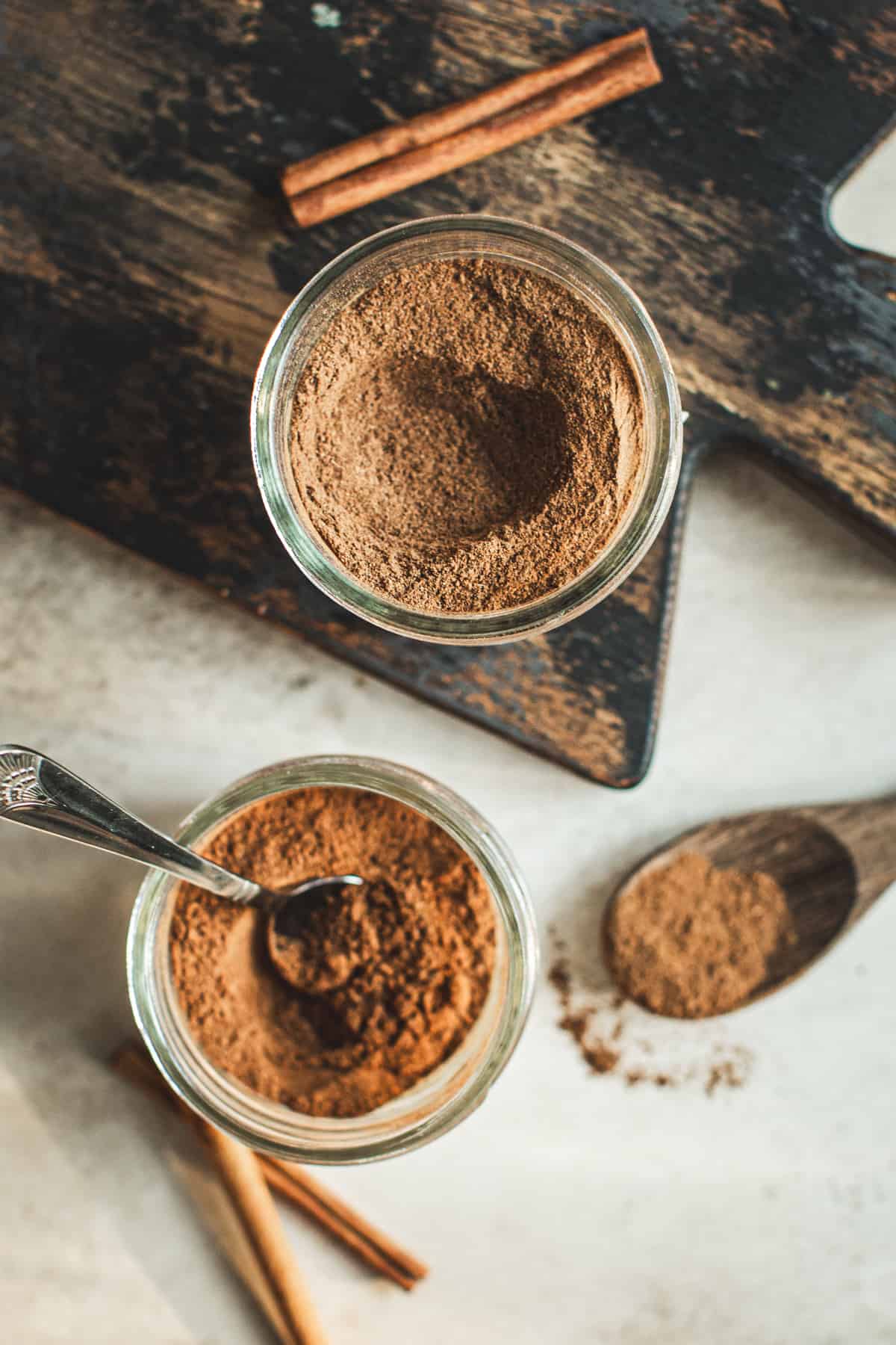 Apple pie spice and pumpkin pie spice in jars.