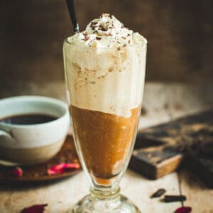 Frozen coffee topped with whipped cream.