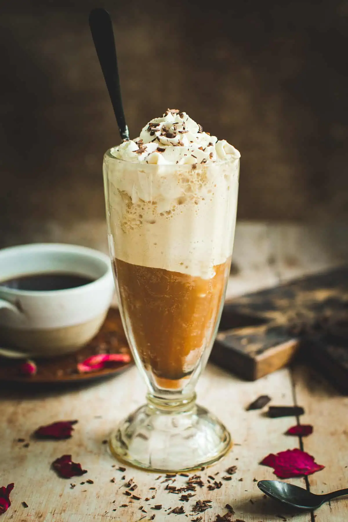 Frozen coffee topped with whipped cream.