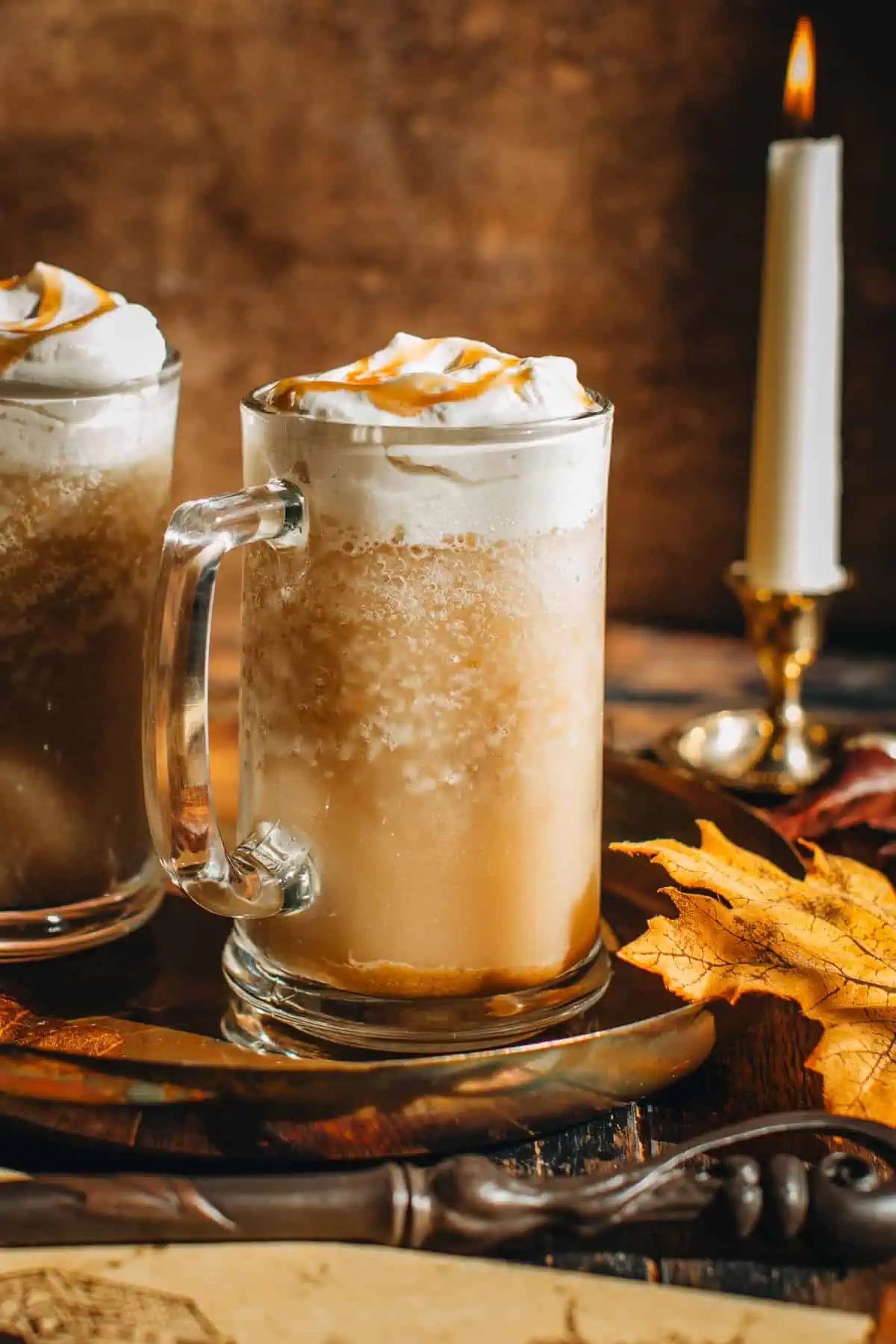 Universal frozen butterbeer topped with whipped cream.