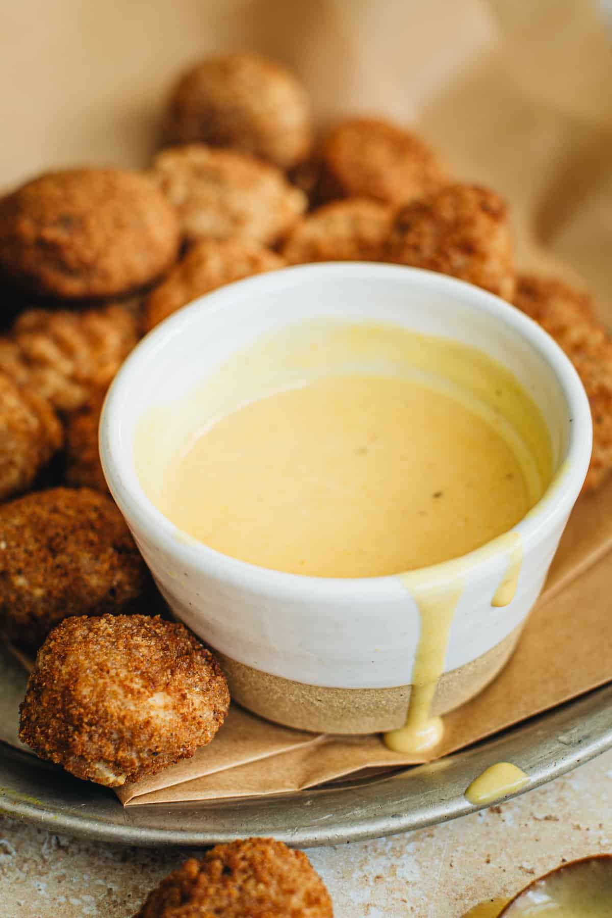 Homemade chick-fil-a sauce in a sauce cup.