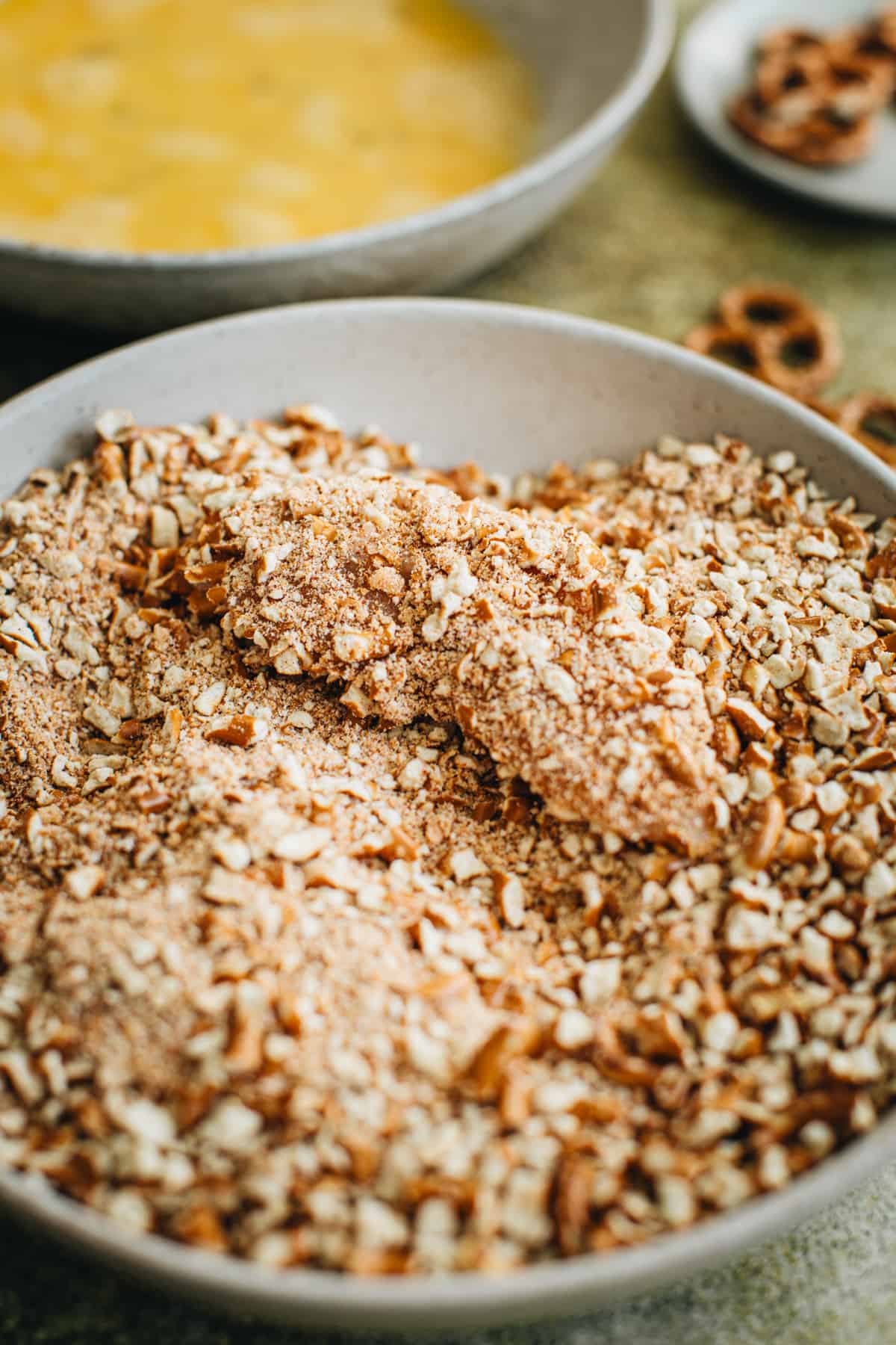 Process step 3 for making pretzel-crusted chicken tenders.