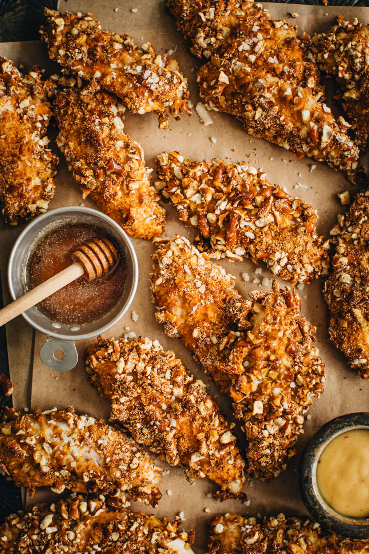 Pretzel crusted chicken with a honey dipping sauce.