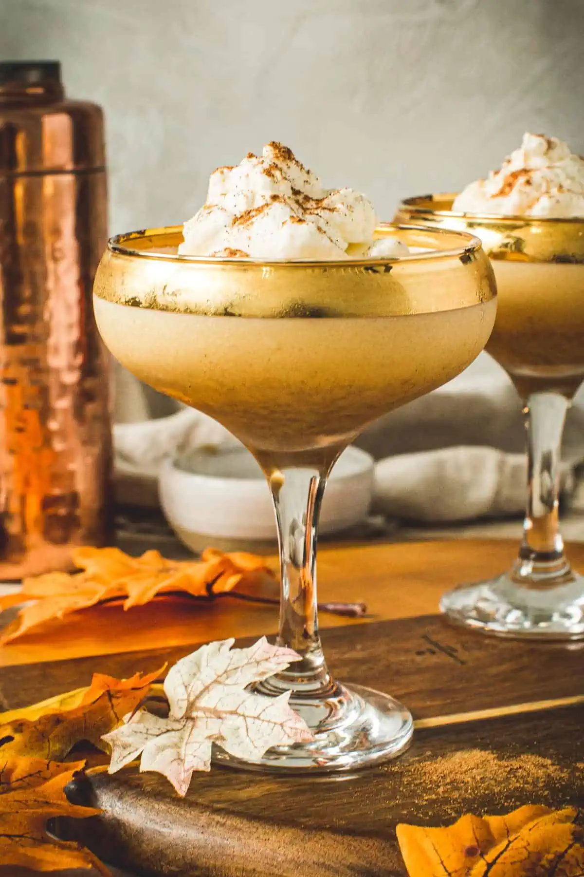 Pumpkin martini topped with whipped cream.