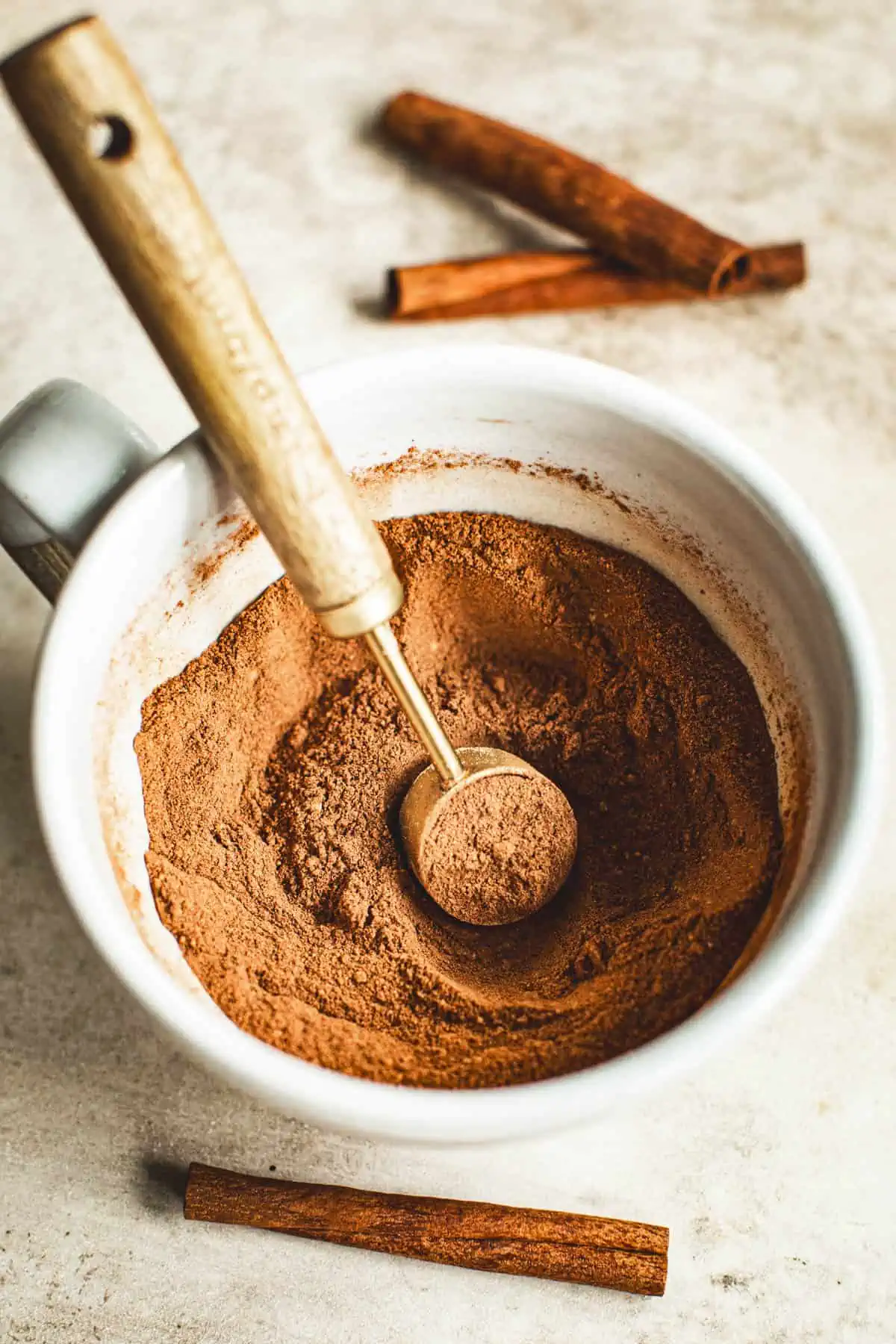 Pumpkin pie spice substitute in a coffee cup.