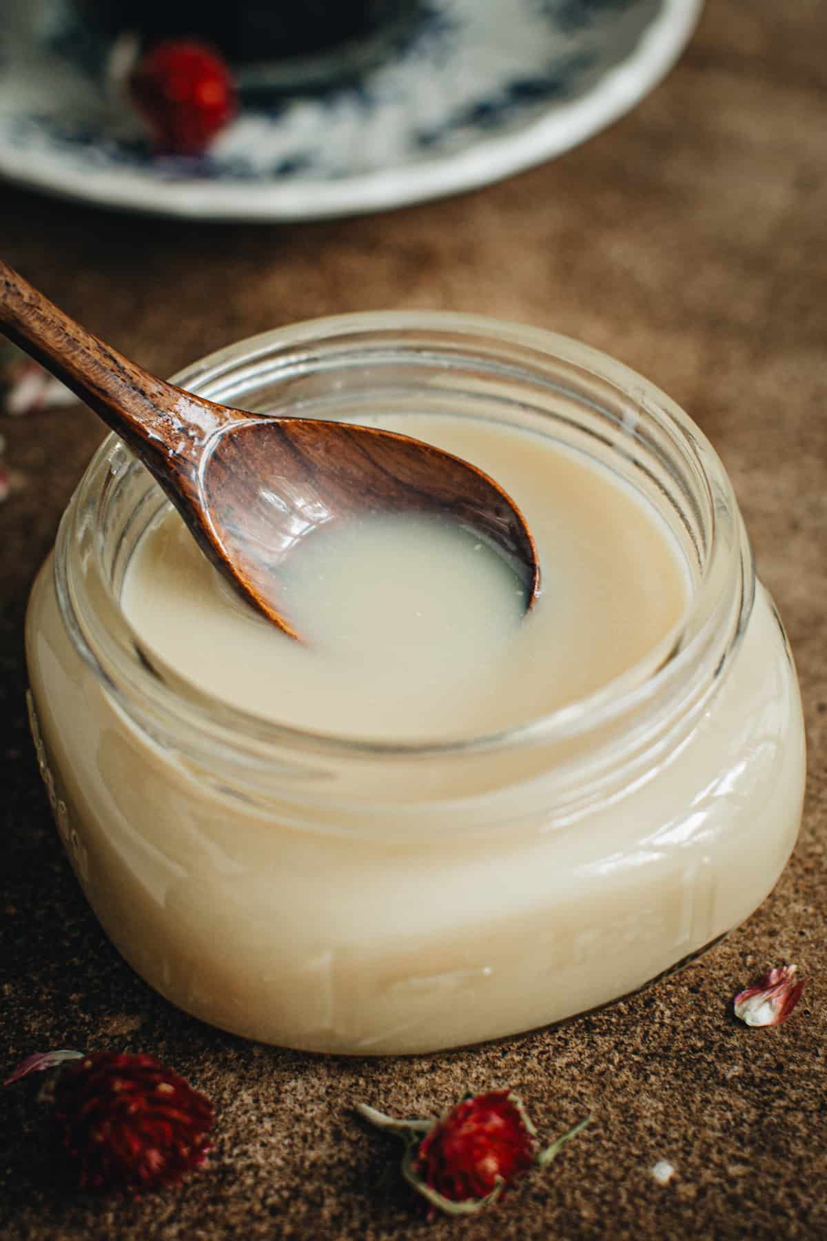 White chocolate sauce in a jar.