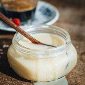 White chocolate syrup in a jar.