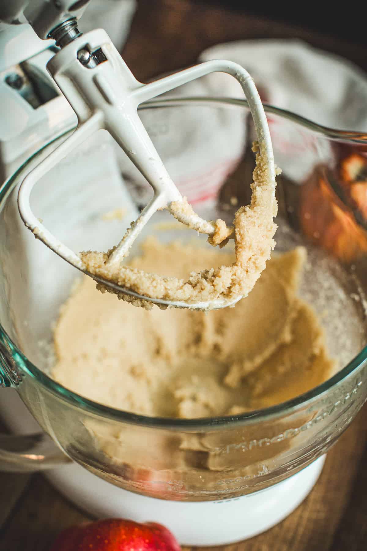 Creamed butter and sugar in a mixing bowl for making Apple Cinnamon Muffins.