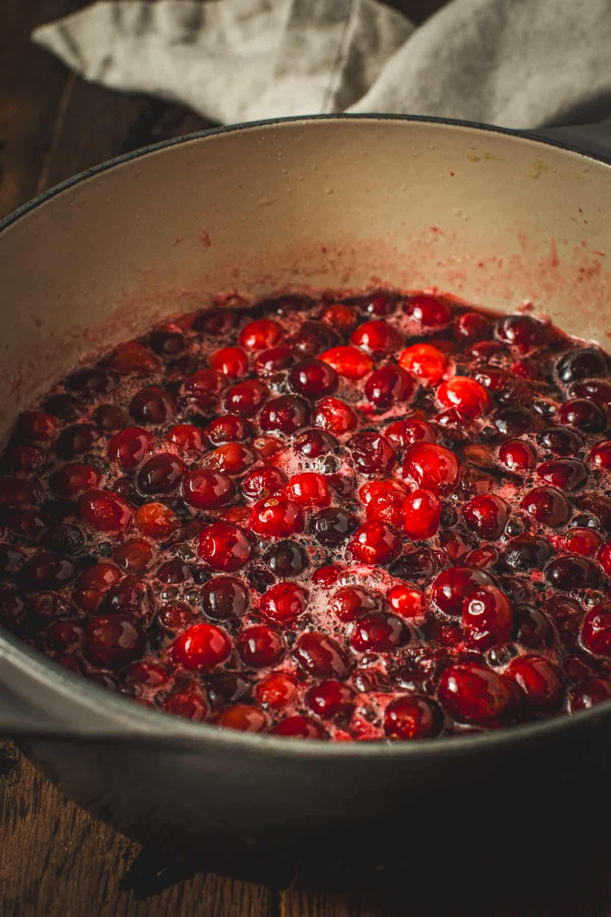 Boil bourbon cranberry sauce in a large pot.