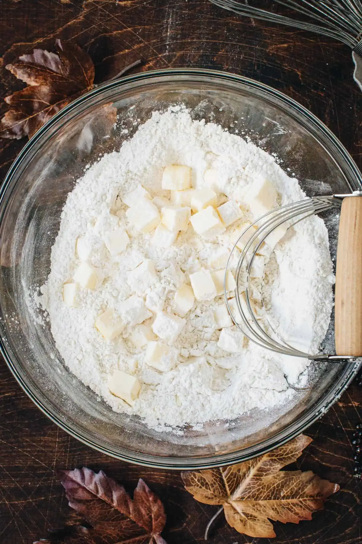 Cubbed butter added to the Chocolate Tart pie crust dry ingredients bowl.