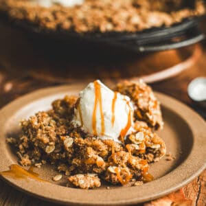 Pumpkin crisp topped with vanilla ice cream and caramel sauce.