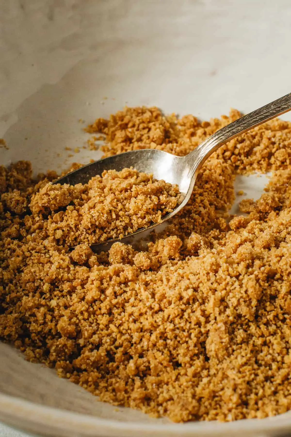 Graham cracker crumb mixture for making sweet potato pie in graham cracker crust.