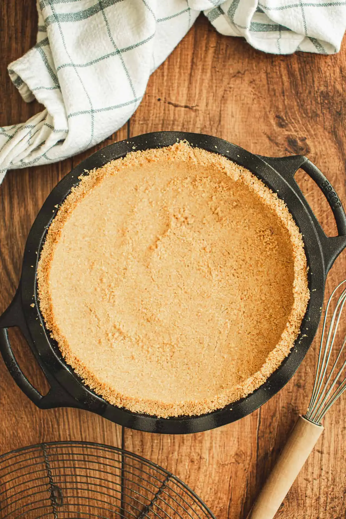 Baked graham cracker crust for sweet potato pie.