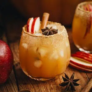 Thanksgiving punch in a pumpkin glass.