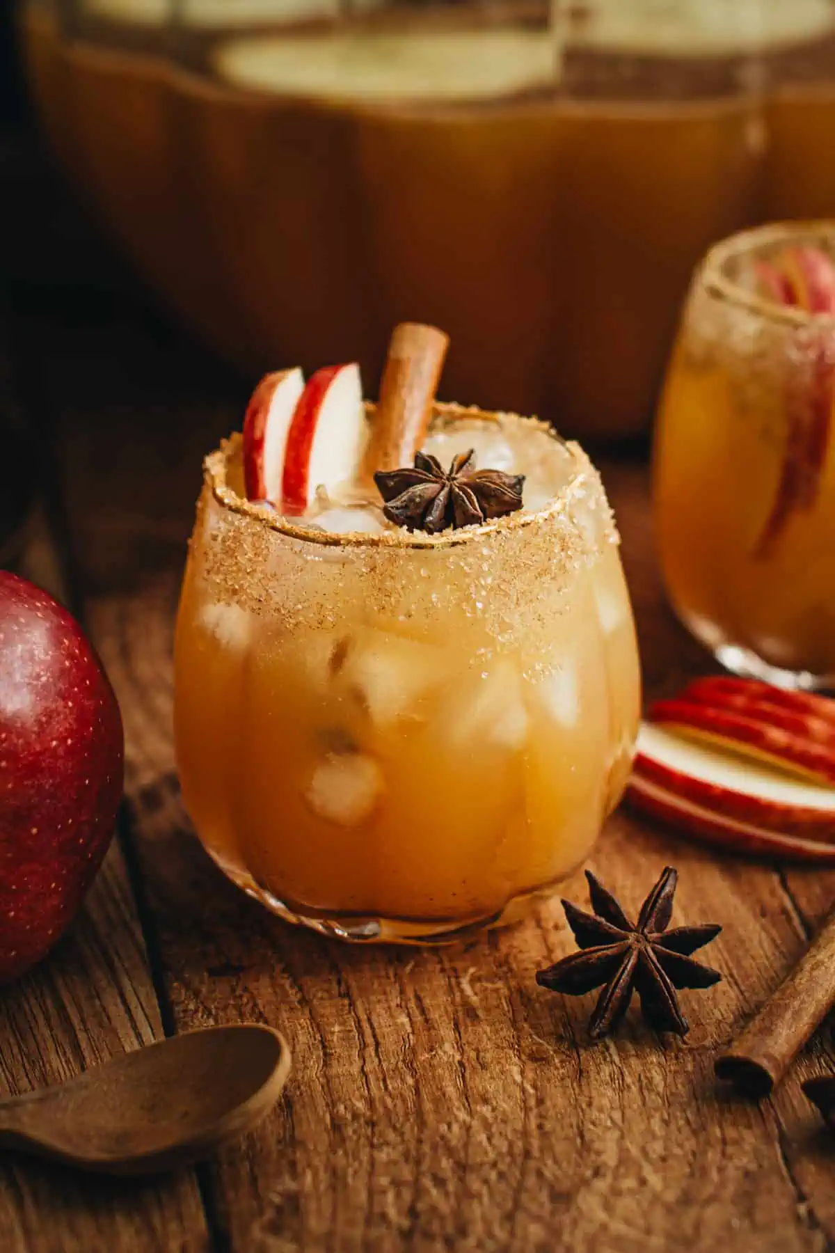 Thanksgiving punch in a pumpkin glass.