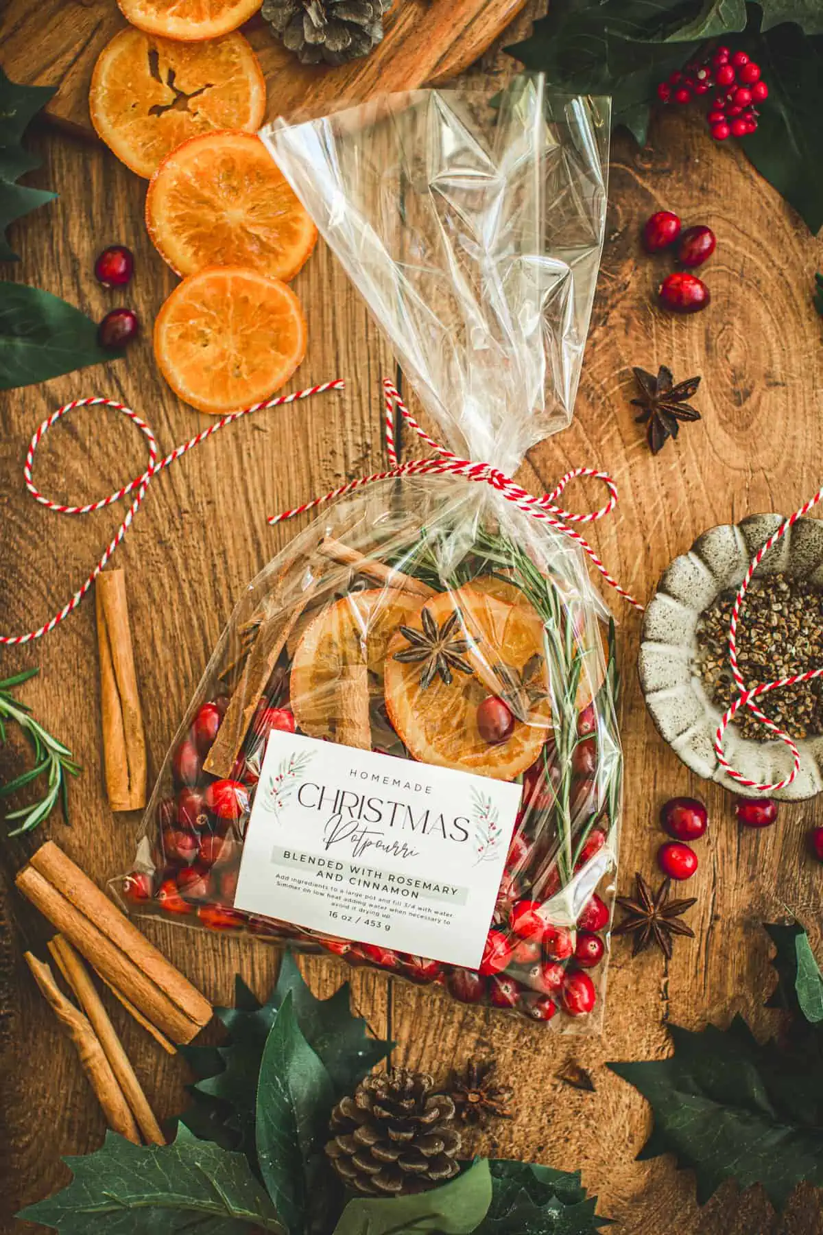 Christmas potpourri in a clear bag tied with bakers twine and with a homemade label.