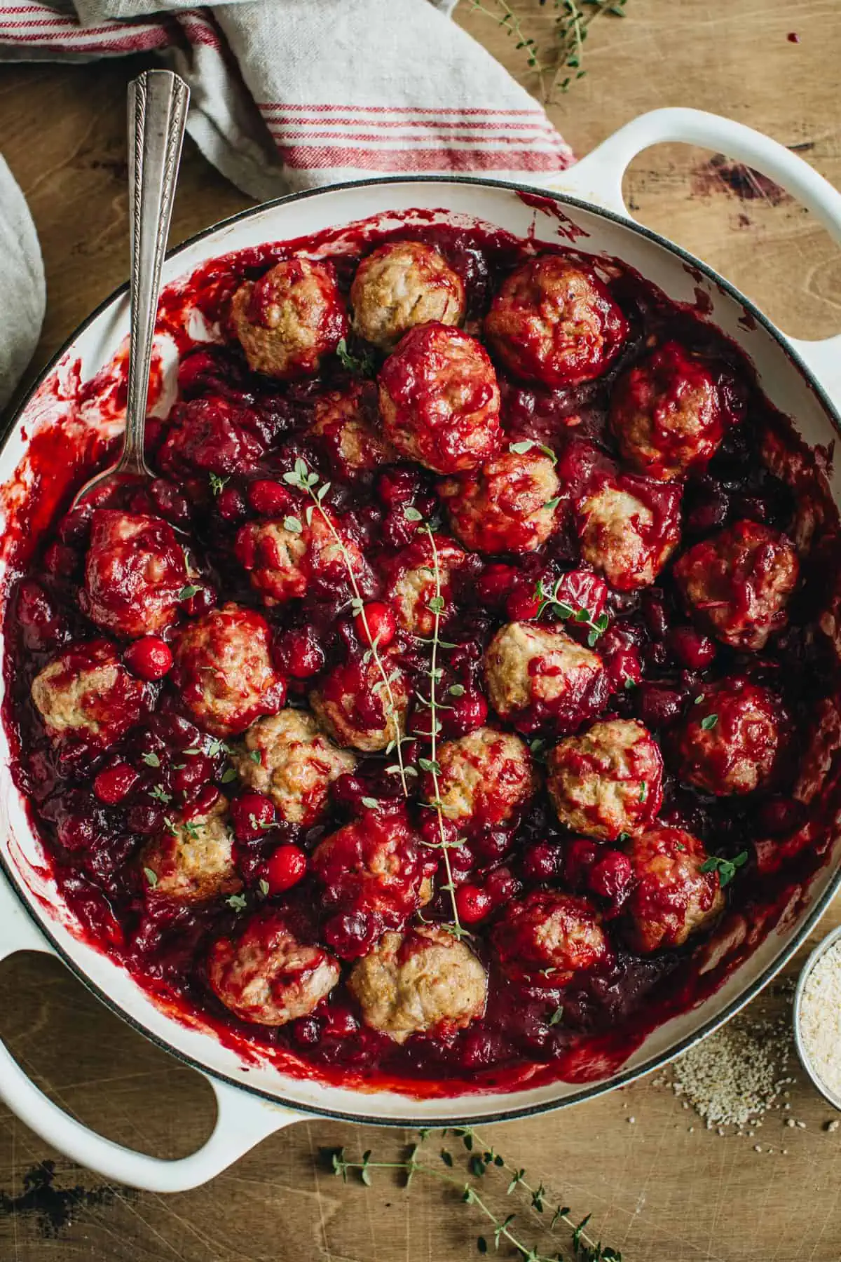 Cranberry meatballs in a large skillet.