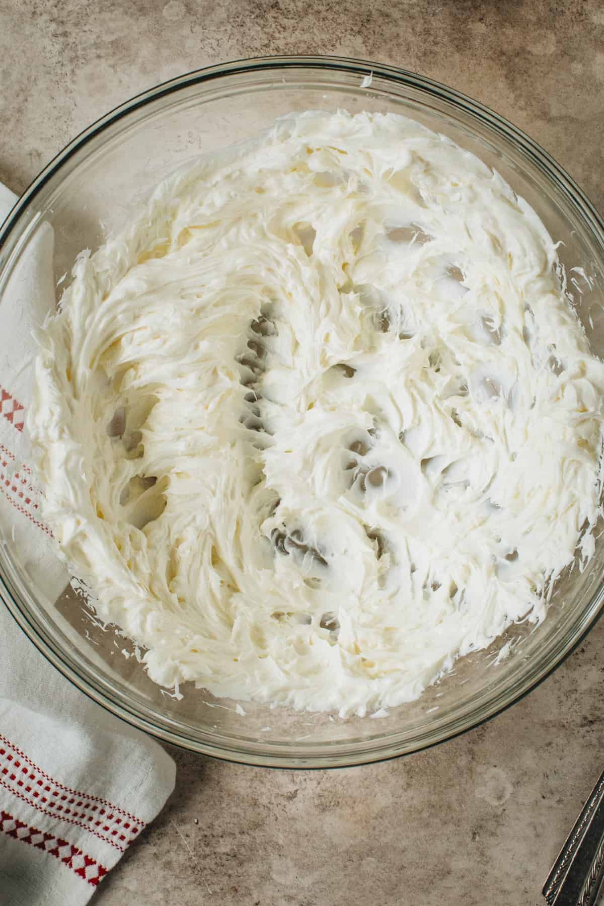 Beaten cream cheese for making gingerbread dip.