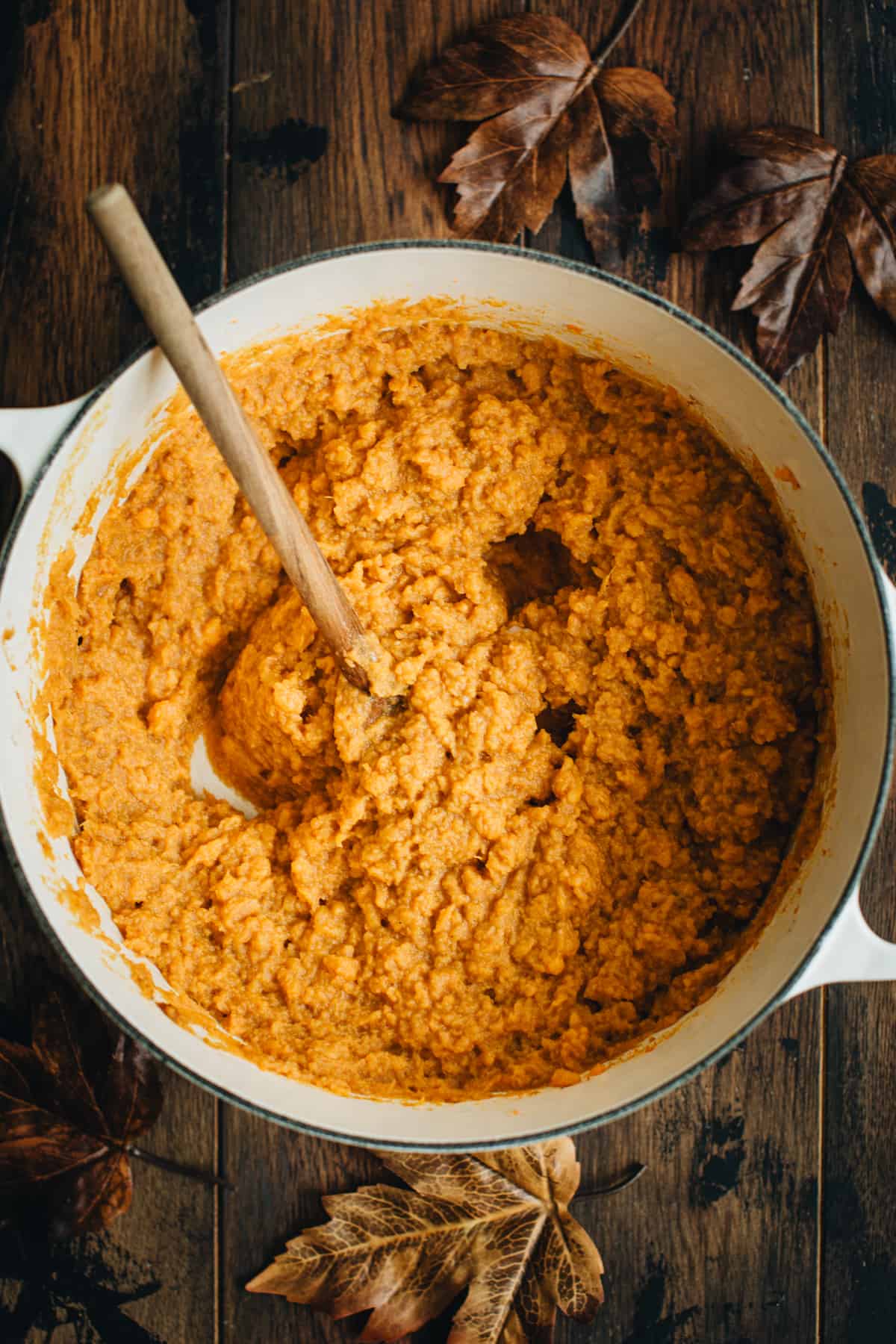 Healthy sweet potato casserole filling in a pot ready to be assembled.