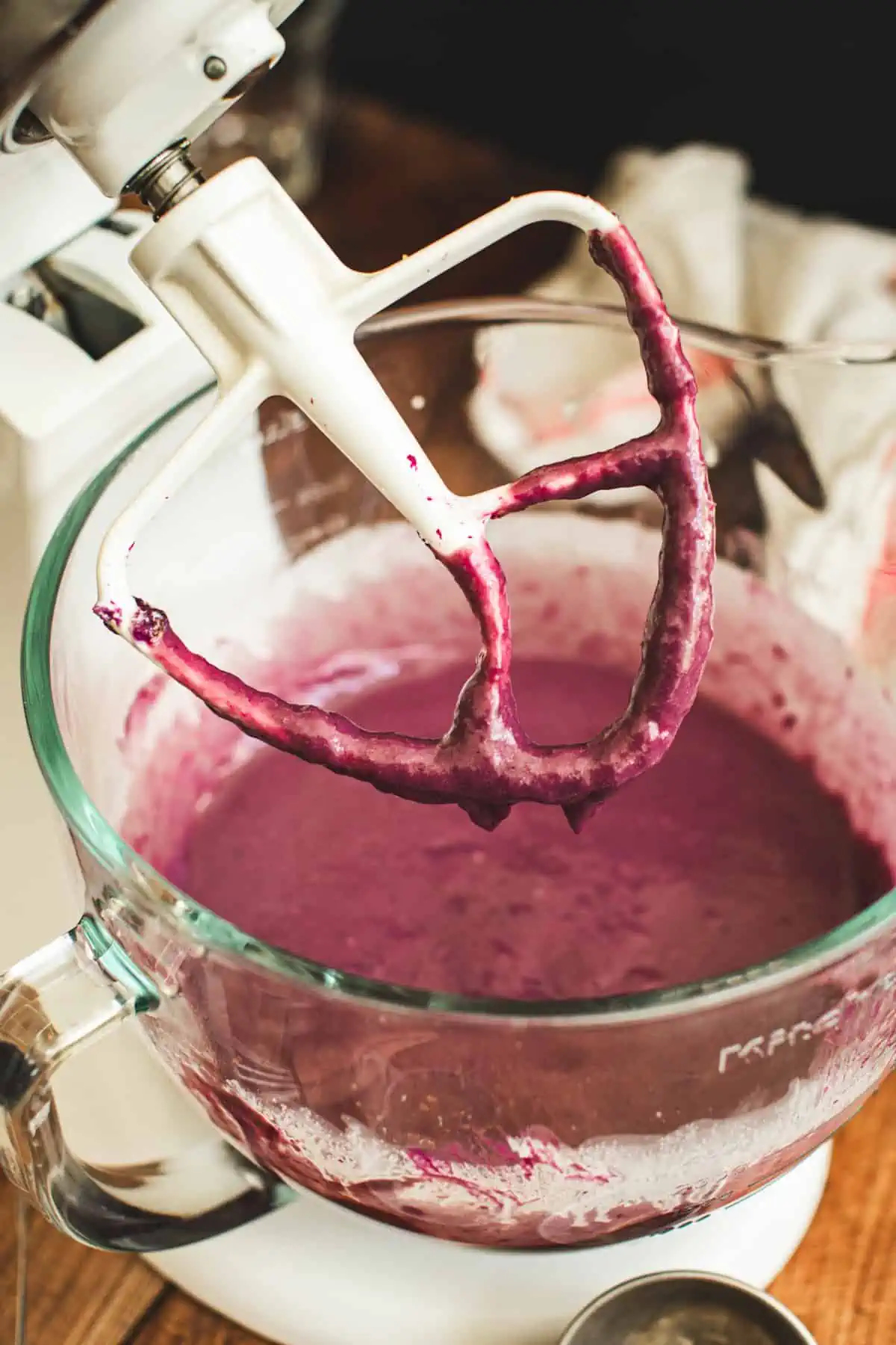 Mixing the filling for purple sweet potato pie.