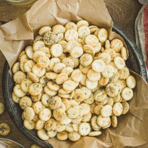 Ranch oyster crackers in a round tin pan.