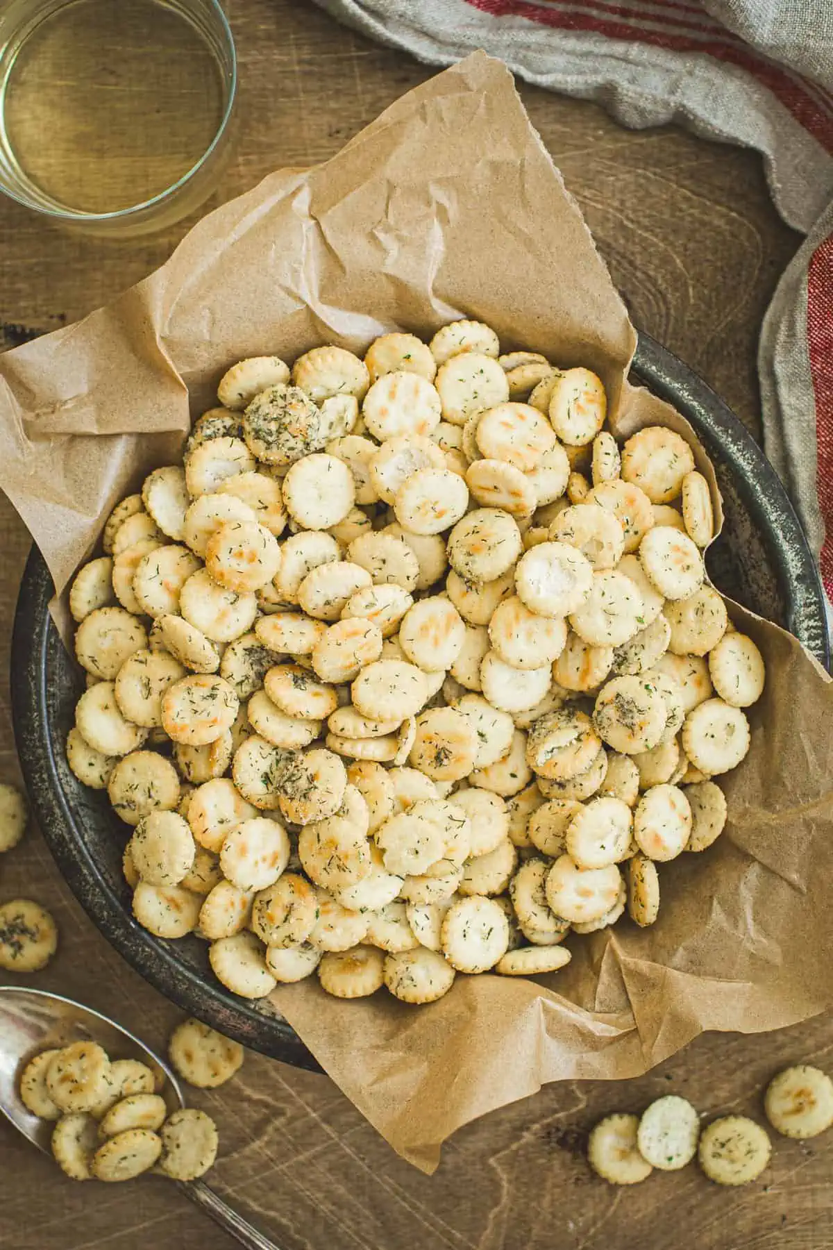 Ranch oyster crackers in a round tin pan.